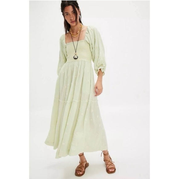 dahlia embroidered maxi dress If spring was a dress. Shop the Dress. https://bddy.me/3eYvrcc shoulder design with rippling ruffles Strapless Dahlia Sequins Embroidered Maxi